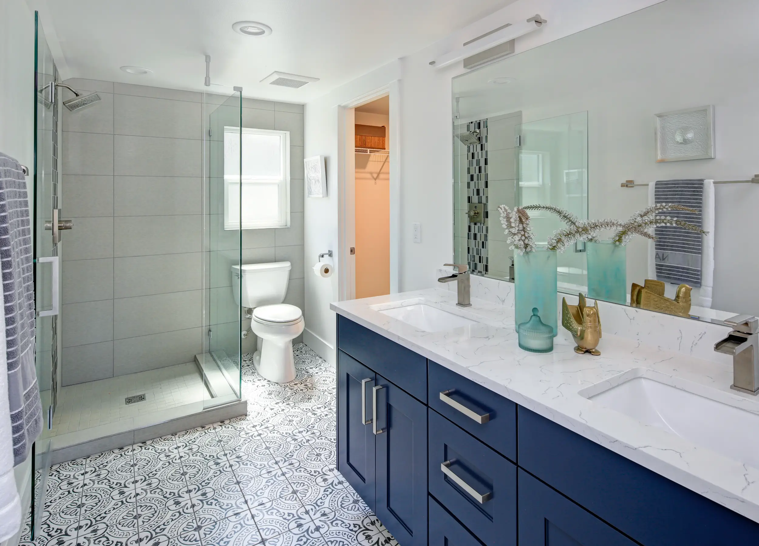 blue vanity with modern tile