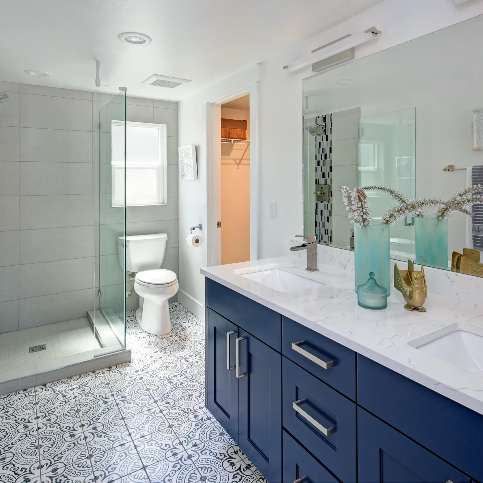blue vanity with modern tile